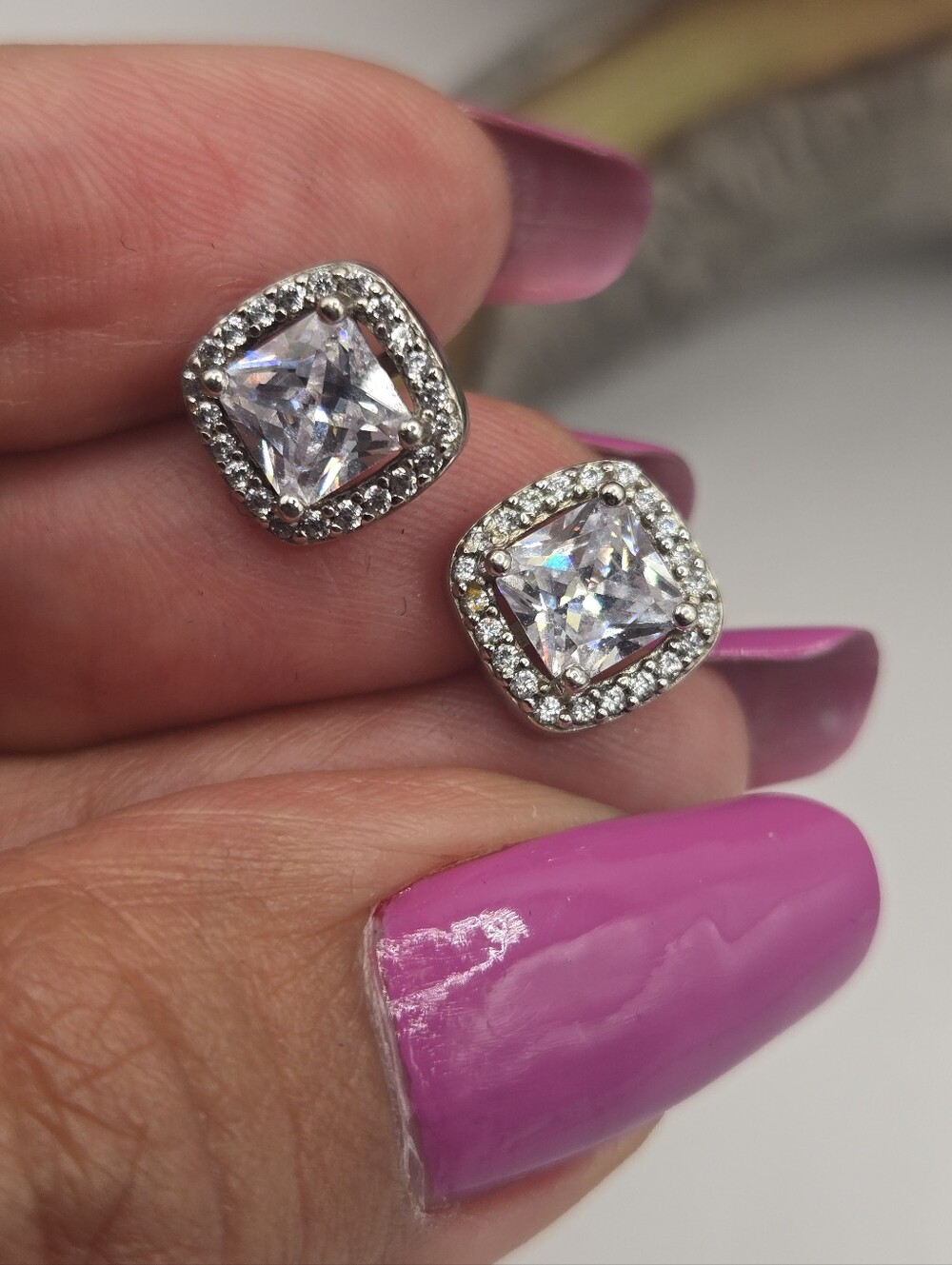 Sterling Silver Cubic Zirconia Halo Stud Earrings in Clear/White